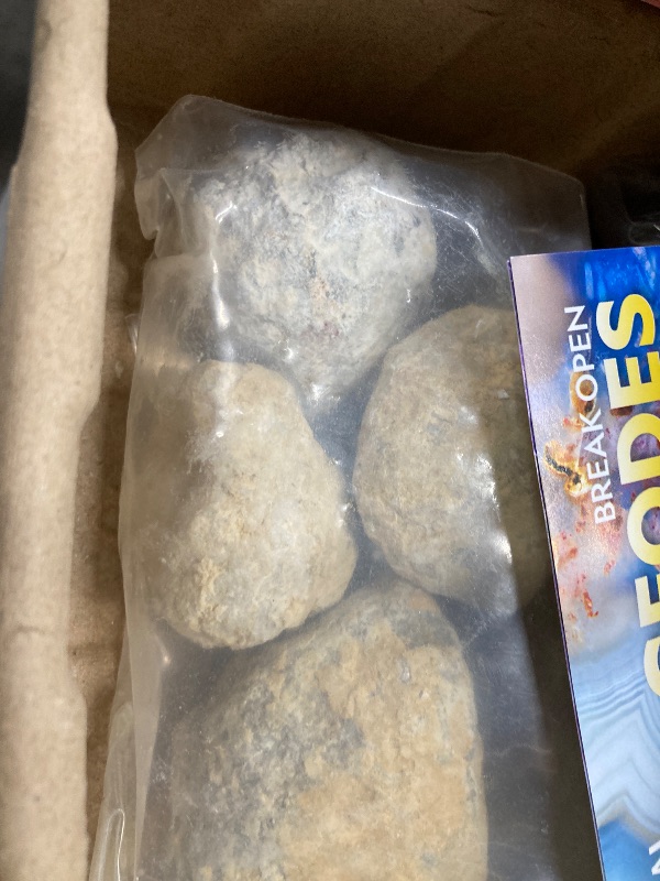 Photo 2 of NATIONAL GEOGRAPHIC Break Open 4 Geodes Science Kit – Includes Goggles and Display Stand - STEM Science Gift for Boys and Girls, Break Your Own Geodes with Crystals (Amazon Exclusive)