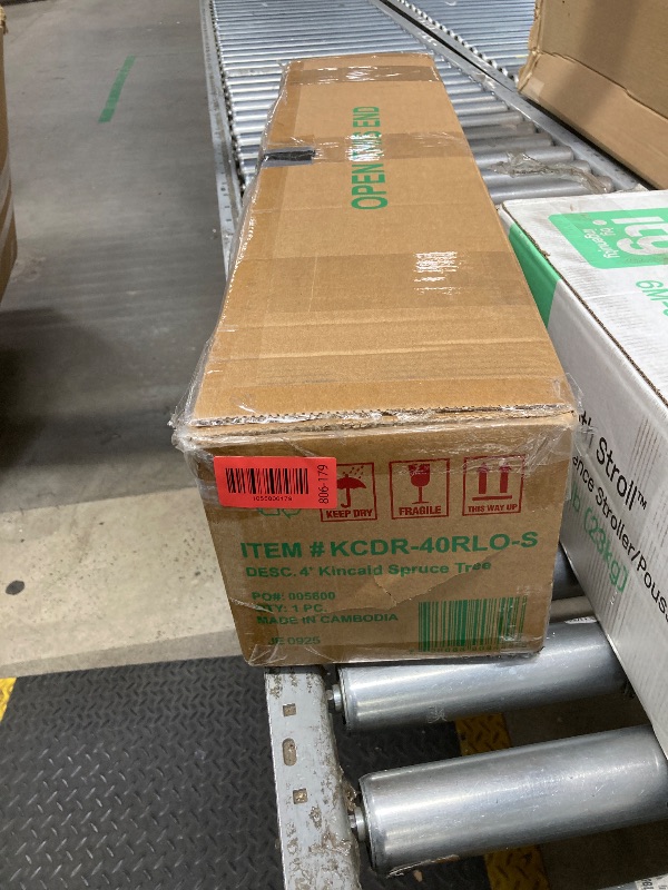 Photo 1 of *Base has some damage* National Tree Company Pre-Lit Artificial Medium Christmas Tree, Green, Kincaid Spruce, Multicolor Lights, Includes Stand, 4 Feet