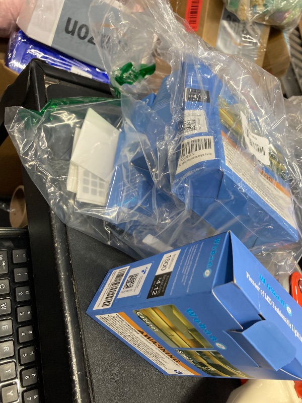 Photo 1 of WOBANE Under Cabinet LED Lighting Kit, 4 PCS Dimmable LED Strip Lights with Remote Control Dimmer, 24W Adapter, Hidden 2700K Warm White Set, Bright 1500lm, Timing, Kitchen, Counter, Shelf, Showcase