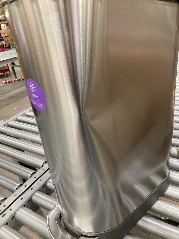 Photo 1 of ***ESTA USADO Y TIENE UN GOLPE EN UNOS DE LOS LADOS ****simplehuman 45 Liter / 12 Gallon Slim Hands-Free Kitchen Step Trash Can, Brushed Stainless Steel