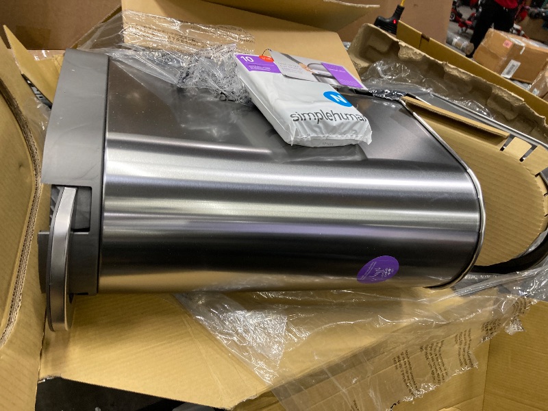 Photo 1 of ***ESTA USADO Y TIENE UN GOLPE EN UNOS DE LOS LADOS ****simplehuman 45 Liter / 12 Gallon Slim Hands-Free Kitchen Step Trash Can, Brushed Stainless Steel