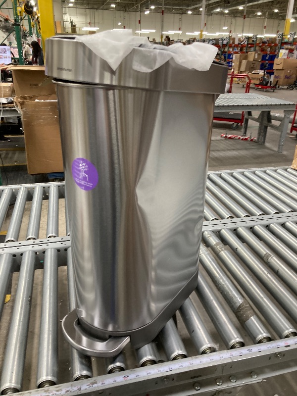 Photo 1 of ***ESTA USADO Y TIENE UN GOLPE EN UNOS DE LOS LADOS ****simplehuman 45 Liter / 12 Gallon Slim Hands-Free Kitchen Step Trash Can, Brushed Stainless Steel