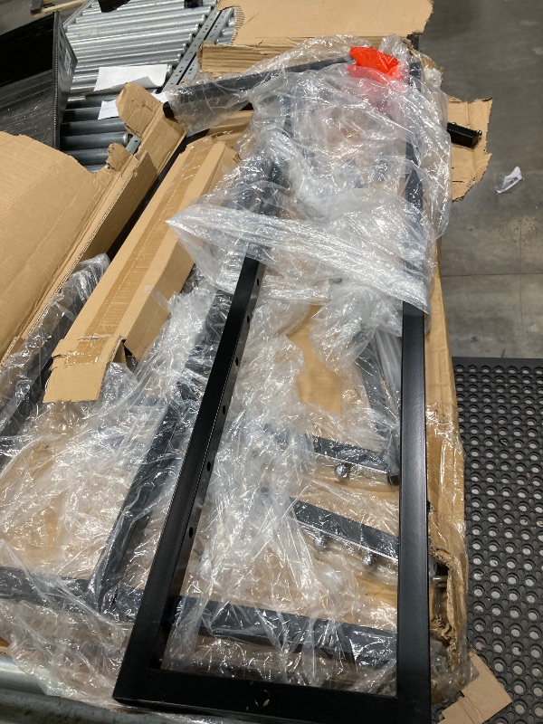 Photo 1 of ****It is missing parts like screws to assemble it, and it is used.*****SSWBasics Black 4 Way Adjustable Clothing Rack with Slanted Arms - Retail Clothing Rack Display - Adjustable Height Arms from 48" to 72" Perfect for Clothing Stores