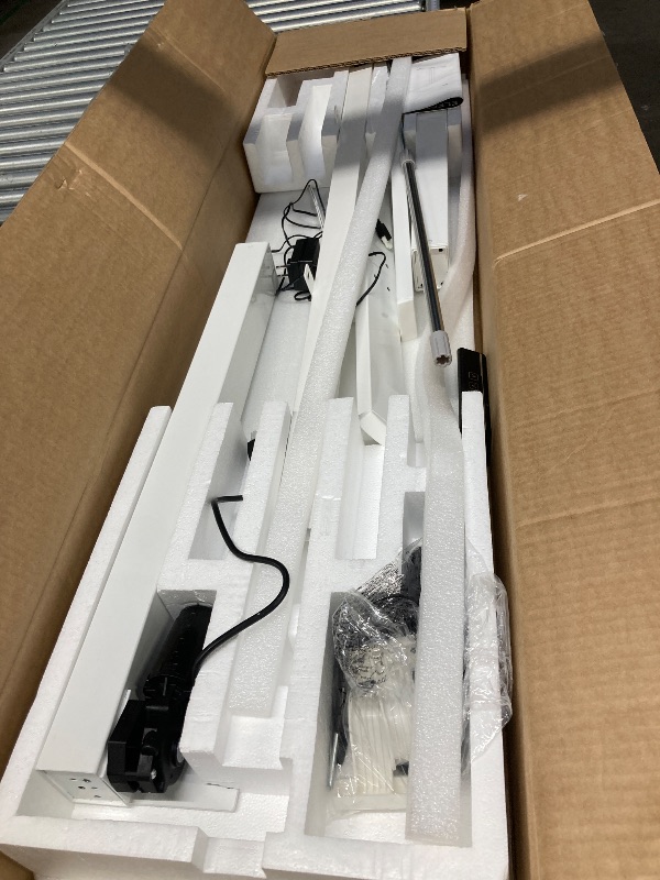 Photo 1 of **used missing ***edx Electric Standing Desk, Height Adjustable Desk, 55 x 24 Inches Ergonomic Stand up Desk with Memory Preset and T-Shaped Metal Bracket for Home Office