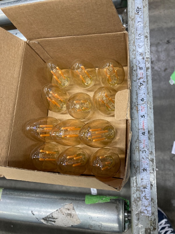 Photo 1 of **** used***12-Pack Dimmable E12 LED Candelabra Bulbs 40Watt Equivalent, 2200K Amber Warm White, 380Lumens, 4W B11 Amber Chandelier Light Bulbs, LED Filament Clear Glass Candle Lamp for Ceiling Fan Home Decor