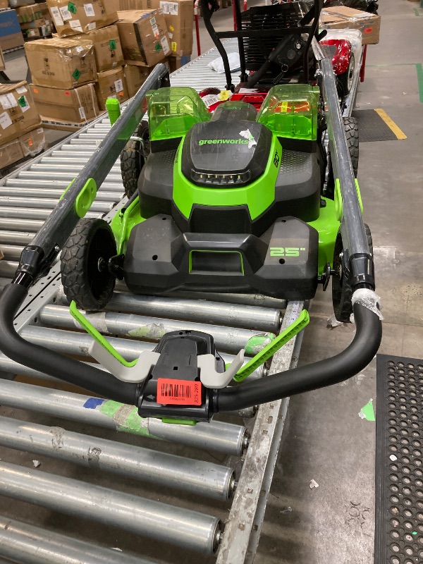 Photo 1 of ***It is used, it is missing parts and it is not known if it works because it could not be tested.****Greenworks 80V 25" Brushless Cordless Self-Propelled Lawn Mower,3 in 1 Dual Blade LawnMover, W/4.0Ah Battery and Rapid Charger Include