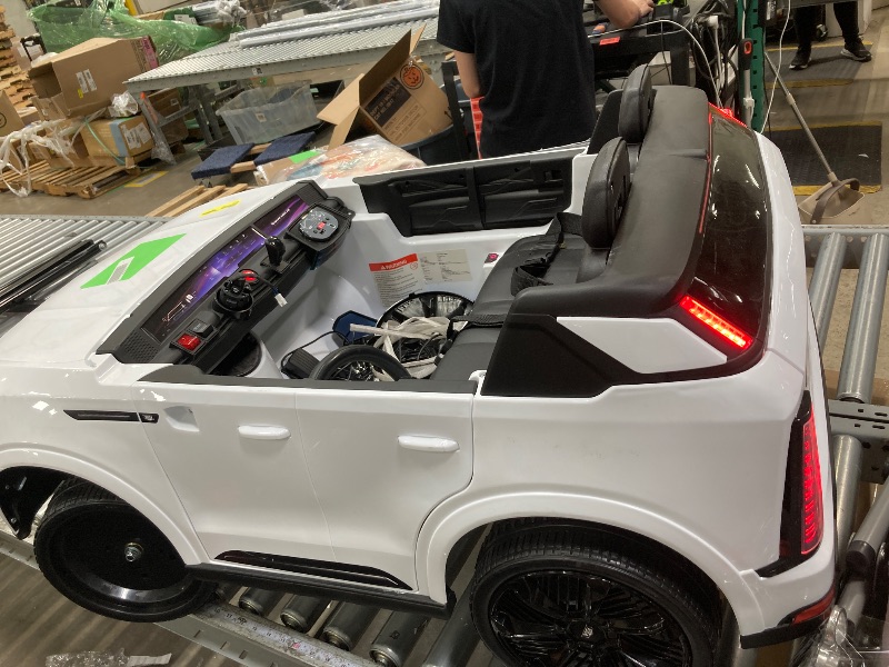 Photo 1 of ****The plug is used and music is heard and the lights come on. What is not known is if it starts.
***Cadillac Escalade IQ 24V Kids Ride on Car,Wisairt 2 Seater Battery Powered Electric Vehicle w/ Remote Control(White)