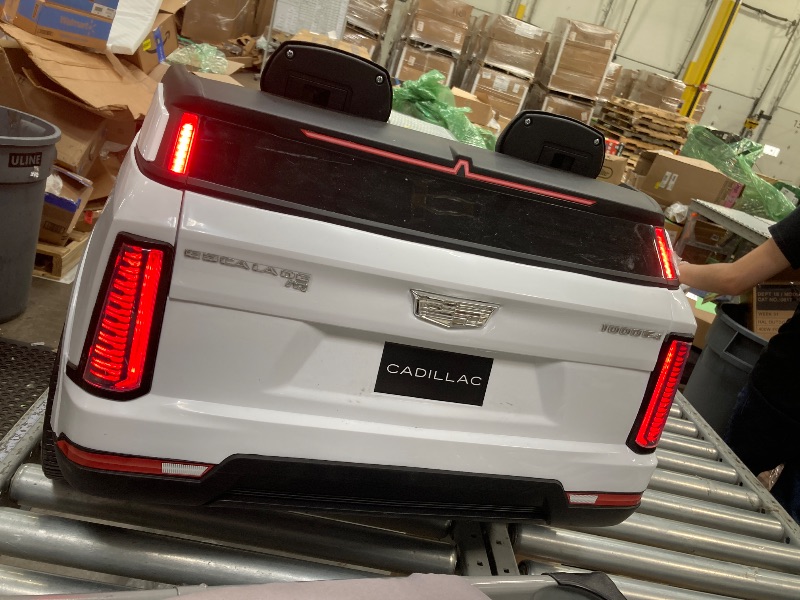 Photo 1 of ****The plug is used and music is heard and the lights come on. What is not known is if it starts.
***Cadillac Escalade IQ 24V Kids Ride on Car,Wisairt 2 Seater Battery Powered Electric Vehicle w/ Remote Control(White)