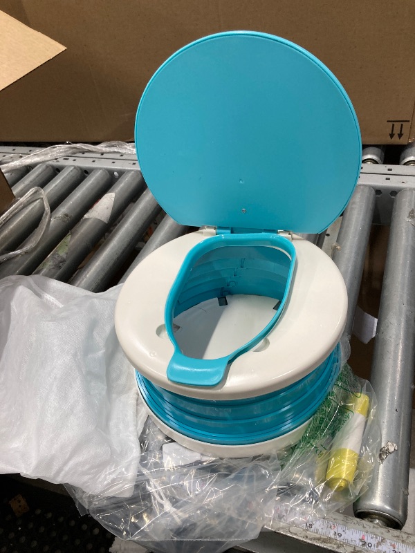 Photo 1 of **used**portable, foldable potty seat for toddler, Training Toilet Seat Emergency Toilet for Car, Camping, Outdoor, indoor (light blue, small)