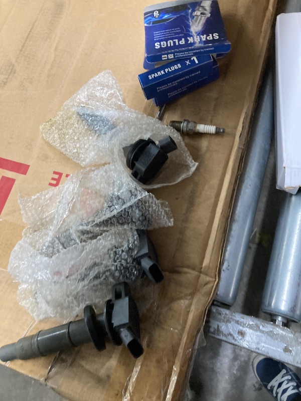 Photo 1 of *-used missing parts**MOTOKU Ignition Coil and Spark Plug for Toyota Camry Highlander Corolla RAV4 Matrix Solara 2.4