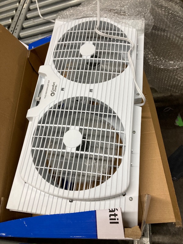 Photo 1 of **use**Comfort Zone 9" Twin Window Fan with Auto-Locking Expanders, 2 Speeds, White