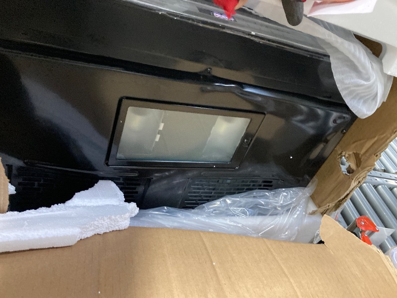 Photo 1 of ***It is used, it works and has several dents on the front and is missing parts***SHARP SMO1461GS Over the Range Microwave Oven with 12.8" Carousel Turntable, 24-inch, 1.4 Cubic Feet, 1,000 Watt, Sensor Cooking, Edge to Edge Black Glass with Stainless Ste