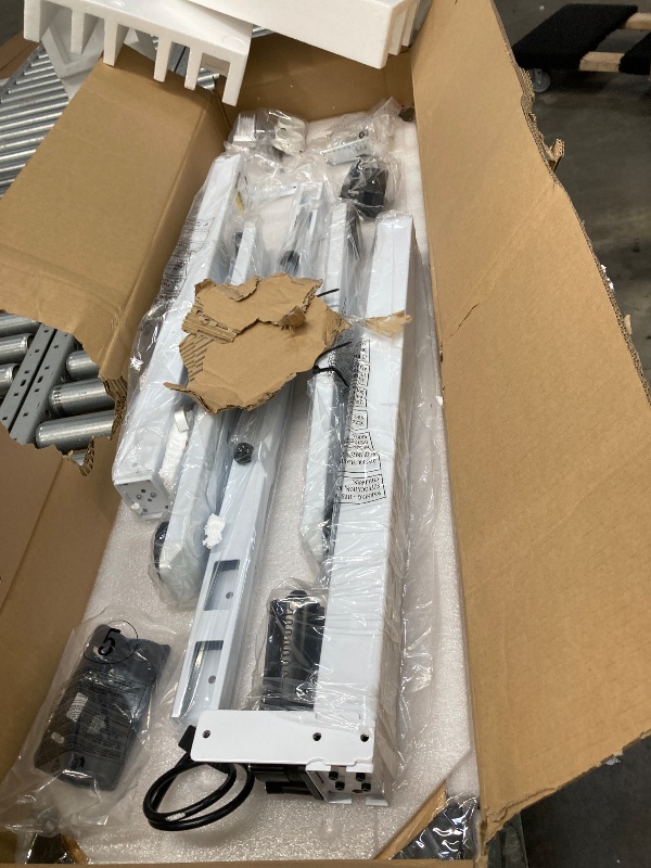 Photo 1 of ***IT IS USED, IT IS NOT KNOWN IF IT IS MISSING ANY PARTS BECAUSE IT IS DISMANTLED, WHICH IS NOT KNOWN IF IT IS 100% FUNCTIONAL**ONCETTA Electric Standing Desk, 40''x24'' Height Adjustable Desk, Home Office Desk with Electric Lift, Sit Stand Desk Workstat