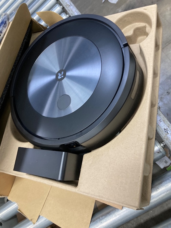 Photo 1 of **IT IS USED, IT IS CONNECTED AND TURNS ON, BUT IT IS NOT KNOWN IF IT WORKS 100%, IT IS MISSING A PART**iRobot Roomba Combo j5 Robot Vacuum and Mop with Dirt Detect Technology, 4-Stage Cleaning System, and Alexa, Siri, and Google Assistant-Enabled Cleanin