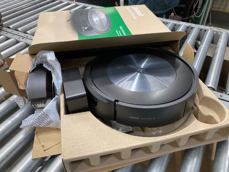 Photo 1 of **IT IS USED, IT IS CONNECTED AND TURNS ON, BUT IT IS NOT KNOWN IF IT WORKS 100%, IT IS MISSING A PART**iRobot Roomba Combo j5 Robot Vacuum and Mop with Dirt Detect Technology, 4-Stage Cleaning System, and Alexa, Siri, and Google Assistant-Enabled Cleanin
