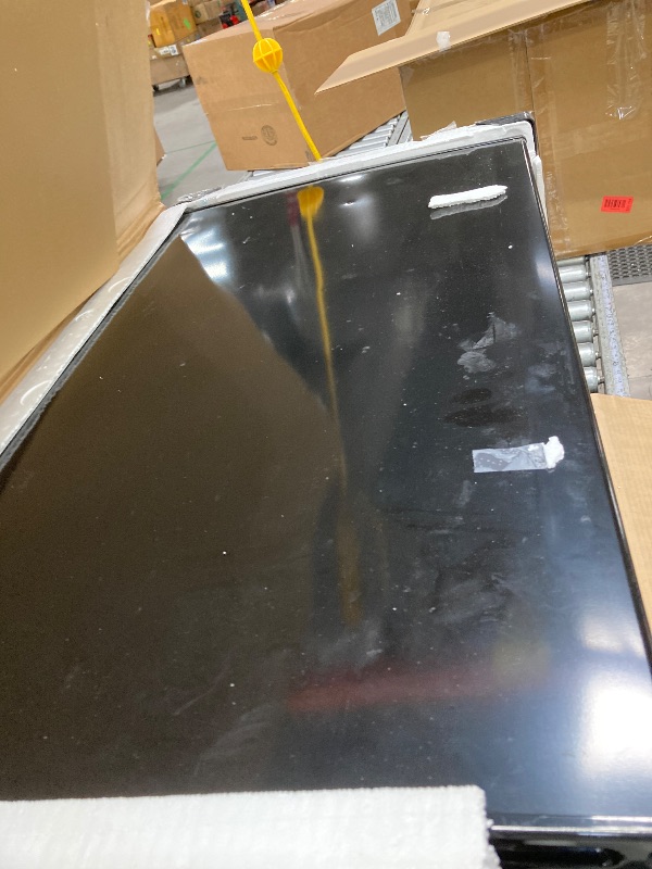 Photo 1 of **It has a small dent on one side, it is used and a little dirty, it was connected and works, it is not known if it is 100%.**Igloo 3.2 Cu.Ft. Single Door Compact Refrigerator with Freezer - Slide Out Glass Shelf, Perfect for Homes, Offices, Dorms - Black