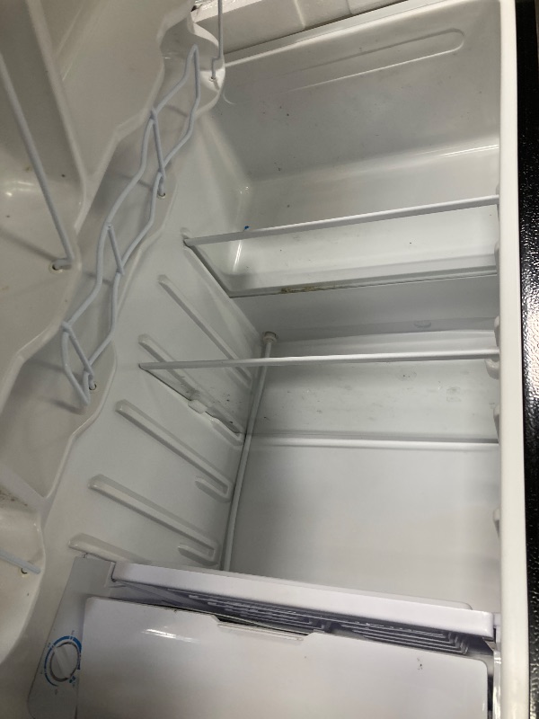 Photo 1 of **It has a small dent on one side, it is used and a little dirty, it was connected and works, it is not known if it is 100%.**Igloo 3.2 Cu.Ft. Single Door Compact Refrigerator with Freezer - Slide Out Glass Shelf, Perfect for Homes, Offices, Dorms - Black
