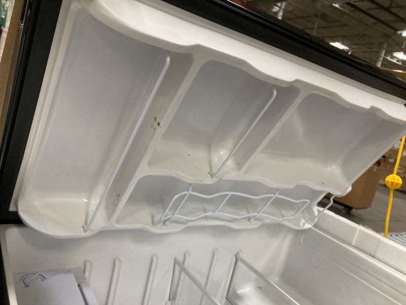 Photo 1 of **It has a small dent on one side, it is used and a little dirty, it was connected and works, it is not known if it is 100%.**Igloo 3.2 Cu.Ft. Single Door Compact Refrigerator with Freezer - Slide Out Glass Shelf, Perfect for Homes, Offices, Dorms - Black