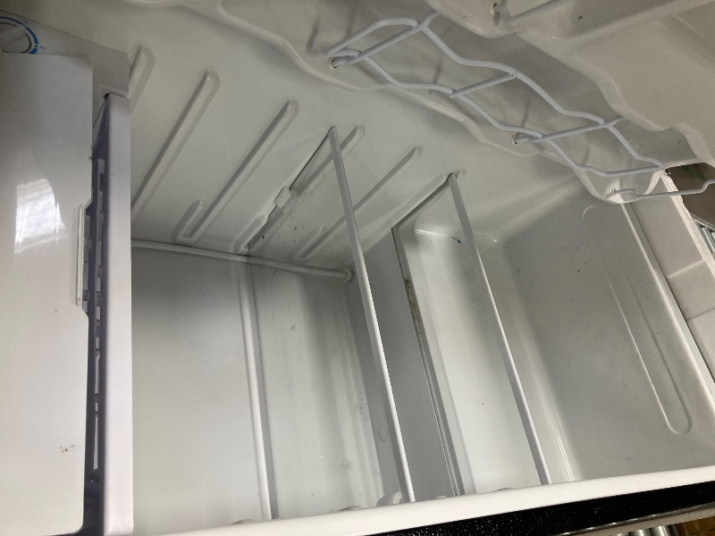 Photo 1 of **It has a small dent on one side, it is used and a little dirty, it was connected and works, it is not known if it is 100%.**Igloo 3.2 Cu.Ft. Single Door Compact Refrigerator with Freezer - Slide Out Glass Shelf, Perfect for Homes, Offices, Dorms - Black