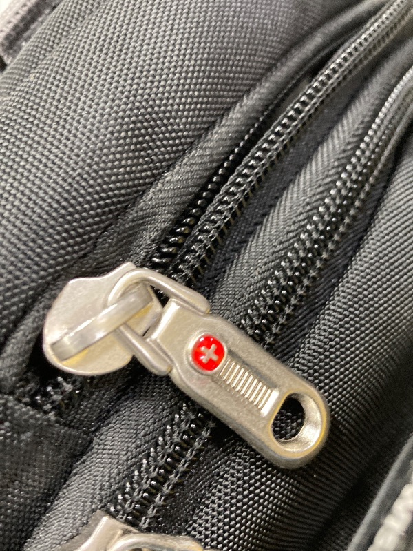 Photo 1 of ***(DAMAGE ZIPPER BROKEN/OFF TRACK)*** 
SwissGear 1900 Scansmart TSA 17 Laptop Backpack, Black, 19-Inch
