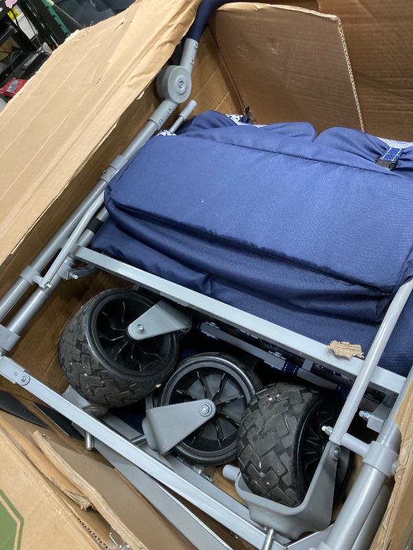 Photo 1 of *Cuts on hand bar* Jeep Wrangler Deluxe 4 Seater Stroller Wagon by Delta Children - Premium Quad Stroller Wagon for 4 Kids with Convertible Seats, Adjustable Push/Pull Handles, Removable Canopy & Flat Fold, Blue