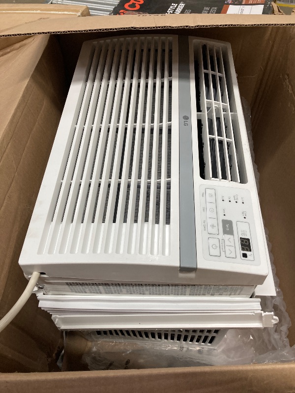 Photo 1 of ***used****LG 8,000 Window Air Conditioner, 115V, 350 Sq.Ft. (14' x 25' Room Size), Quiet Operation, Electronic Control with Remote, 3 Cooling & Fan Speeds, Auto Restart, 8000 BTU, White