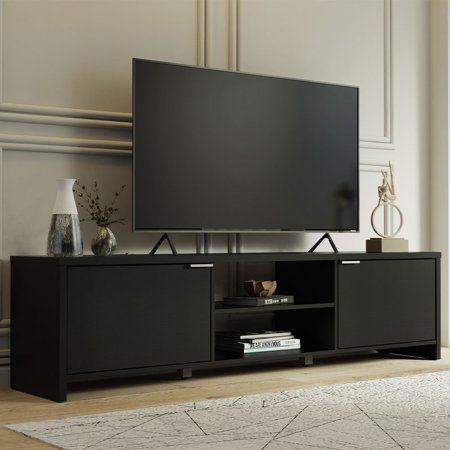 Photo 1 of ***MISSING PARTS +  USED******MADESA TV Stand for TV's up to 80 Inches, Entertainment Center 71L Wood in Black | 19 H X 71 W X 15 D in | Wayfair 69228N1CF
