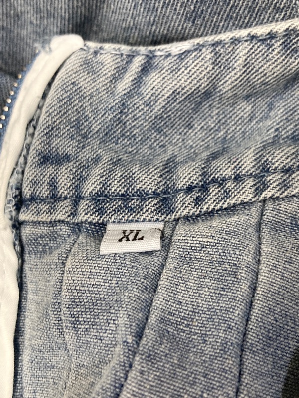 Photo 1 of ***DAMAGE -SELLING AS IS*** 
yoeasy Women's Sleeveless V Neck Shorts Denim Romper Tie Front Ruffle Cute Loose Jean Short Overalls with Pockets (Size XL, Blue)