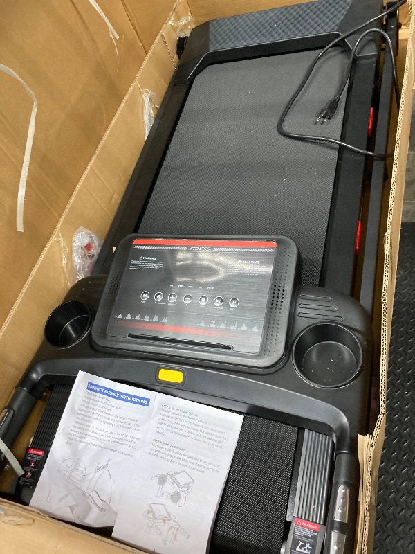 Photo 1 of ** DOES NOT WORK, PARTS ONLY** Cardio Flex Foldable Treadmill with Incline, Hand Rails, and Remote Control
