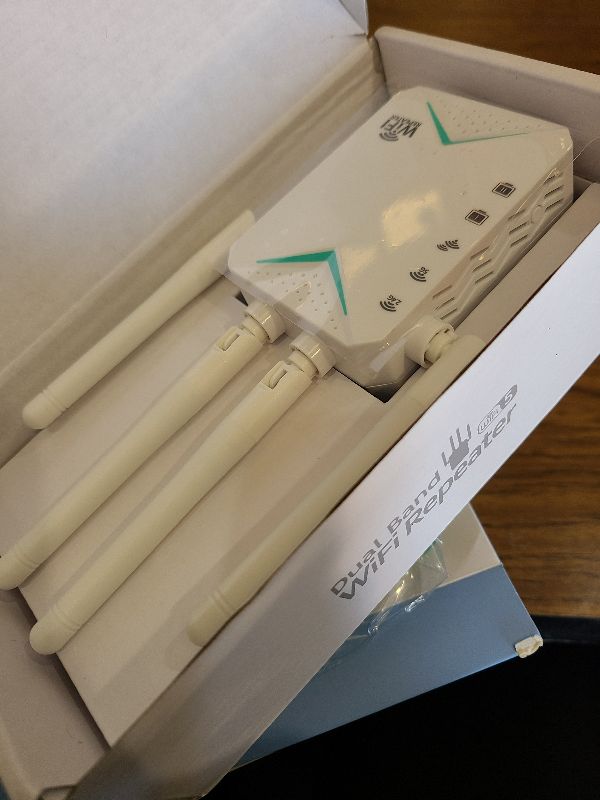 Photo 1 of 2025 WiFi Extender Signal Booster for Home - 1200Mbps Dual Band, Covers 12880 Sq Ft & 108 Devices, Long Range Internet Booster with Ethernet Port, Easy Setup