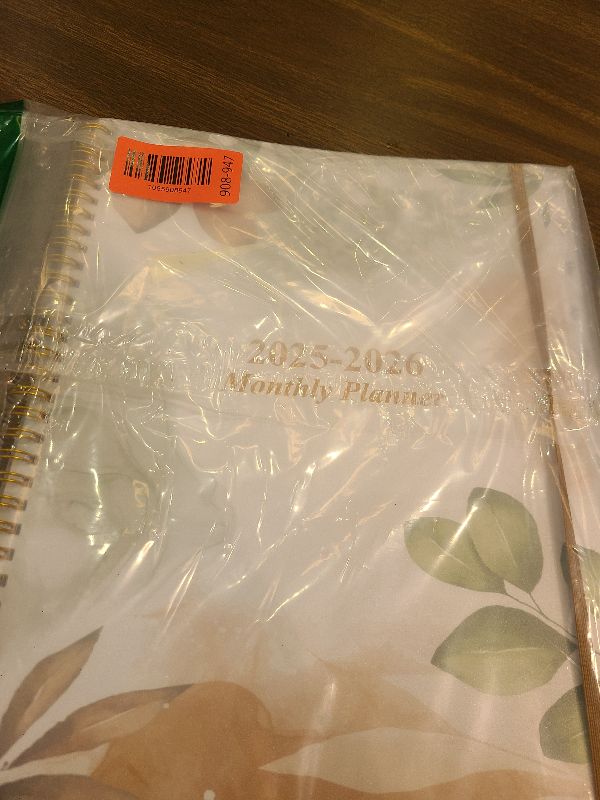 Photo 1 of 2025-2026 Monthly Planner - 18 Monthly Calendar, October 2025 - December 2026, Two Pages Per Month, 9" x11" Planner with Tabs, Inner Pocket, Rose Leaf