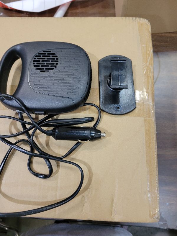 Photo 1 of 12V Portable Car Heater, All Seasons Defroster Defogger Fan 2 Modes in 1 with 360° Rotation, Plug Cigarette Lighter Design, Built - in Safety Fuse, For Cars Trucks Vehicles, Black