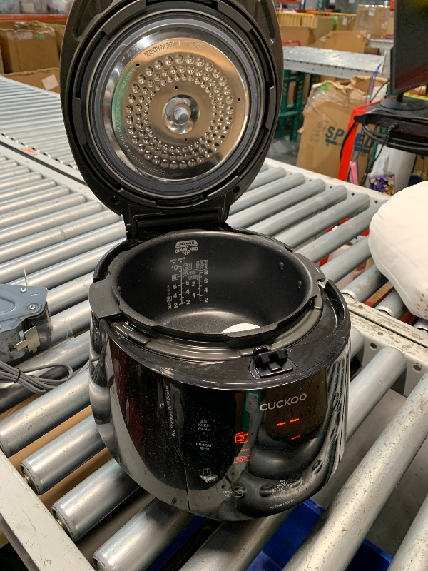Photo 1 of **SOME SCRATCHES ON TOP, TURNS ON** CUCKOO High Pressure Rice Cooker 10-Cup Uncooked / 20-Cup Cooked with Nonstick Inner Pot, Large Rice Maker with 13 Menu Options and Steam Plate, Fuzzy Logic Tech, Voice Guide, Black (CRP-P1009SB)