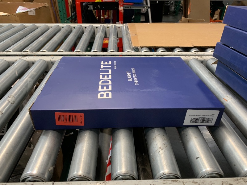 Photo 1 of ***FACTORY SEALED***BEDELITE Faux Fur Throw Blanket for Couch, Soft and Cozy 3D Ribbed Fluffy Blanket, Thick Warm Plush Fuzzy Faux Rabbit Fur Blanket for Women Gift (Beige, 50"x 60")