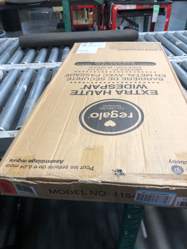 Photo 1 of ***FACTORY SEALED*** Regalo 36-Inch Extra Tall and 49-Inch-Wide Walk Thru Baby Gate, Includes 4-Inch and 12-inch Extension Kit, 4 Pack of Pressure Mount Kit and 4 Pack of Wall Mount Kit