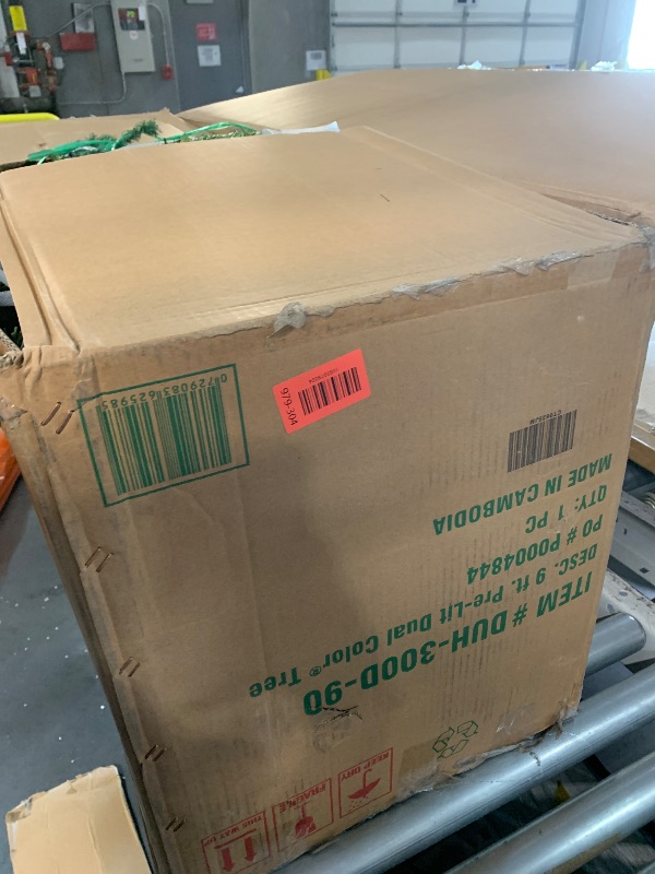 Photo 1 of ***(MAJOR DAMAGE/ MISSING PARTS/SEE NOTES FOR DETAILS)***National Tree Company 9 ft Pre-Lit Dunhill Fir Artificial Christmas Tree, 900 LED Lights, 4,026 Tips, Foot Pedal, 10 Light Functions, Includes Stand, Green