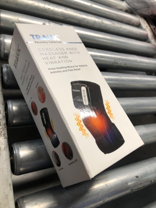 Photo 1 of (MISSING CHARGER) ***PARTS ONLY***TRAKK Heating Massaging Knee & Elbow Brace and Wrap- Rechargeable Multiple Mode Pain Relief