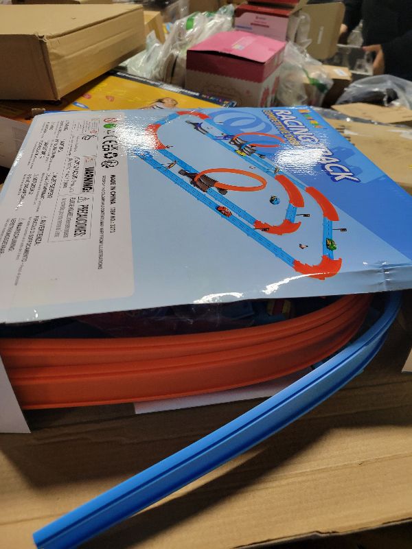 Photo 1 of ?Slot Car Race Track Sets with 360° Thrill Loops & 4 High-Speed Cars, 64 Pcs Large Flexible Racing Track for Kids Ages 3-5 4-8 8-12, Race Car Toys Gift for Boys Girls Birthday Christmas