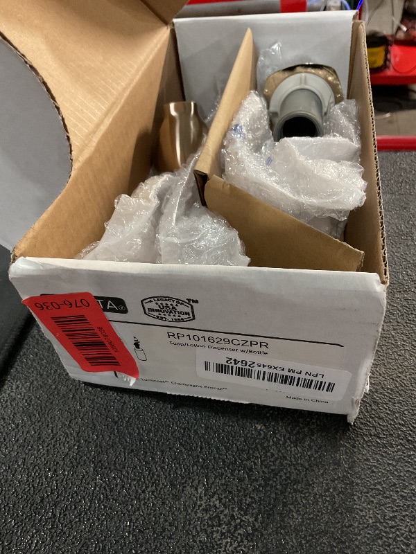 Photo 1 of ***(USED/ UNKNOWN IF MISSING PARTS/ UNABLE TO TEST ITEM)***DELTA FAUCET RP101629CZPR Stryke Soap Dispenser, Lumicoat Champagne Bronze