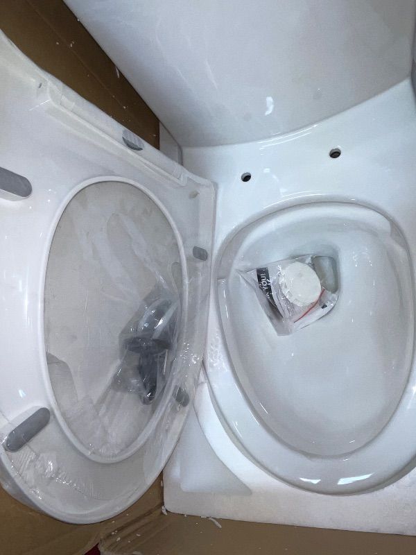 Photo 1 of ***************MISSING THE TANK LID**************
Swiss Madison St. Tropez SM-1T254HB One-Piece Elongated Toilet Vortex Dual-Flush 1.1/1.6 gpf with Comfort Chair Seat ADA Height in Glossy White with Black Hardware