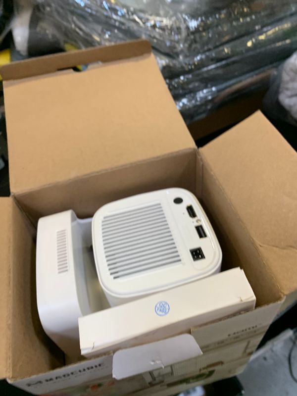 Photo 1 of ?Auto Focus&1080P?Magcubic Mini Smart Projector with 4K Support, Portable Projector with Wifi and Bluetooth, 5W Speaker, Built in Apps, Voice Control, Outdoor Movie Projector