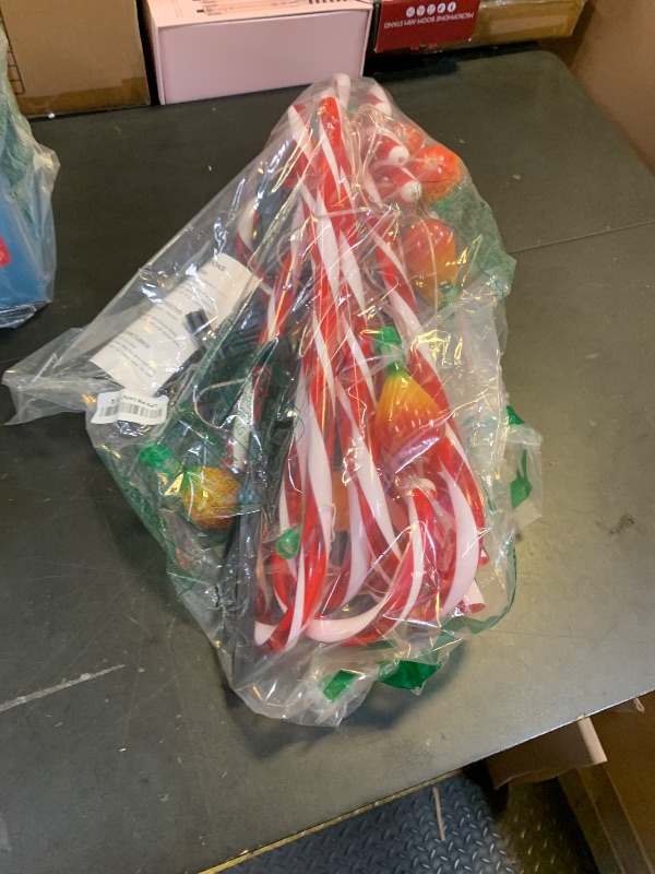 Photo 1 of 12 Pack Outdoor Solar Christmas Decorations, 180 Bright LED Solar Candy Cane Christmas Lights 8 Lighting Modes, Waterproof Outside Xmas Decorations with Lantern Decor Lights for Pathway Yard Garden