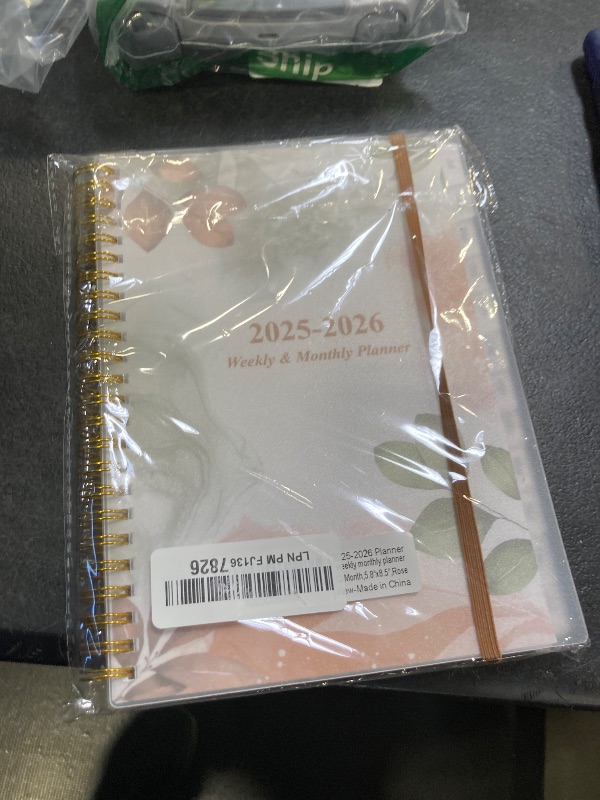 Photo 1 of 2026 Planner - A5 Weekly & Monthly Planner Spiral Bound, January 2026 - December 2026, with Flexible Cover, Tabs, Inner Pocket, 6.4" x 8.5", Rose Leaf