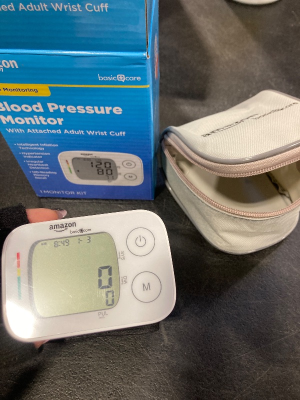 Photo 1 of Amazon Basic Care Wrist Blood Pressure Monitor - Digital BP Monitor with Large Display and Intelligent Inflation Technology