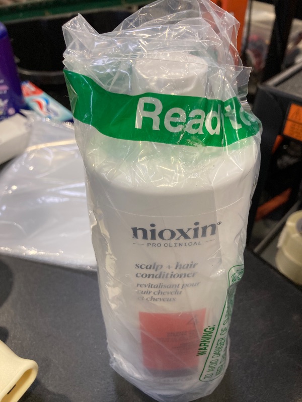 Photo 1 of Nioxin System 4 Scalp + Hair Conditioner | For Colored or Damaged Hair with Progressed Thinning | With Niacinamide and Biotin | 33.8 Fl oz.