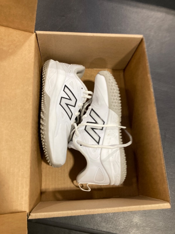 Photo 1 of New Balance Women's Fresh Foam Velo V4 Turf-Trainer Softball Shoe, White/Black, 5 M