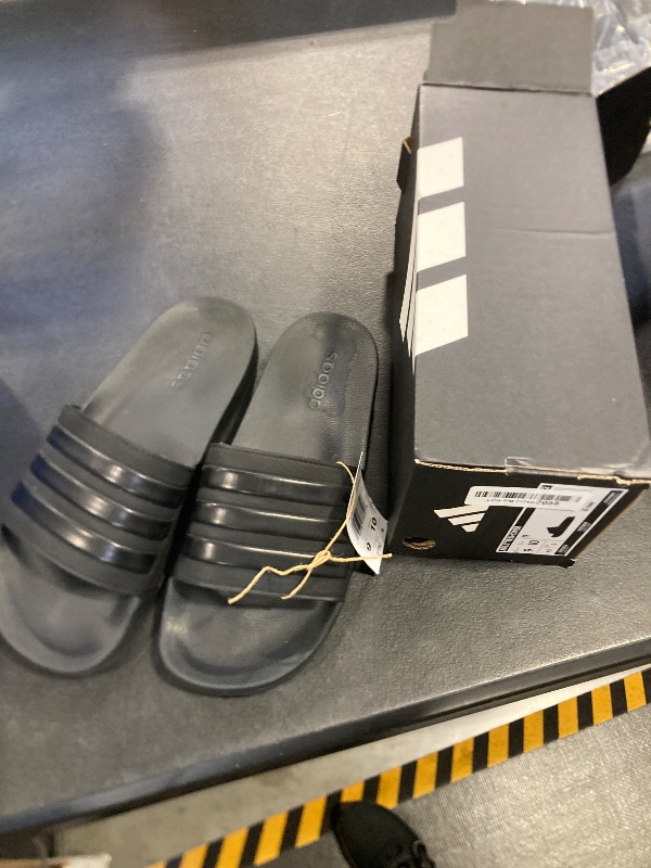 Photo 1 of adidas Unisex Shower Slide Sandal, Core Black/Core Black/Core Black, 9 US Men