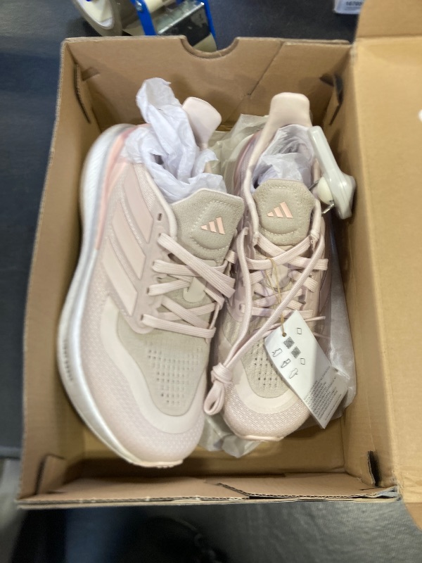 View 2 of Adidas Women's Pureboost 5, Putty Mauve/Sandy Pink Met./Sandy Pink, 6 it has a sensor still attached