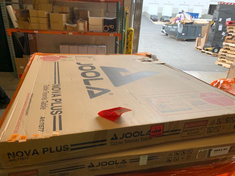 Photo 1 of JOOLA NOVA DX Indoor/Outdoor Table Tennis Table with Weatherproof Net Set