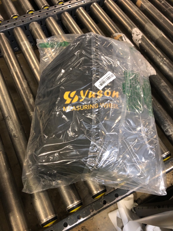 Photo 1 of YS YUSON Metric Measuring Wheel in Meters, High Accuracy Measure Wheel with Carrying Bag for Construction, Survey, Roadwork & Landscaping, Distance Measuring Tool,Foldable, 12-Inch, Up to 10,000m